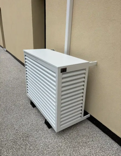 Cache d'une unité extérieure de climatisation